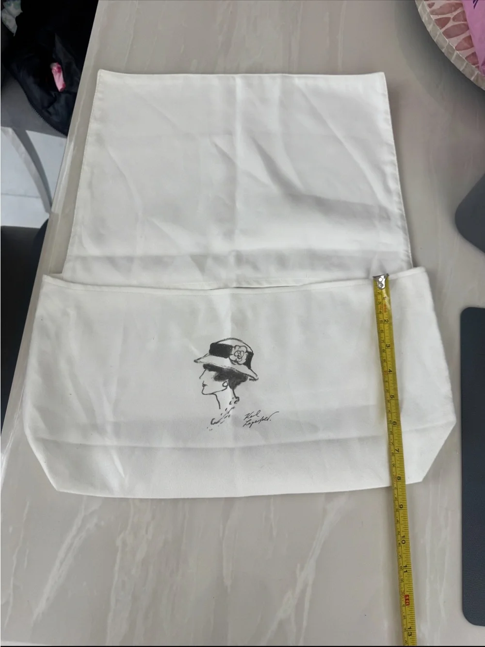 CHANEL White Dust Bag with Black Quilted Grid